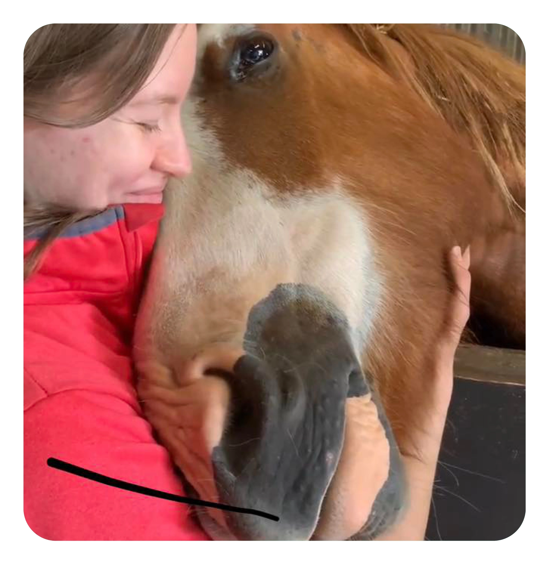 woman on a horse doing the heart sign 